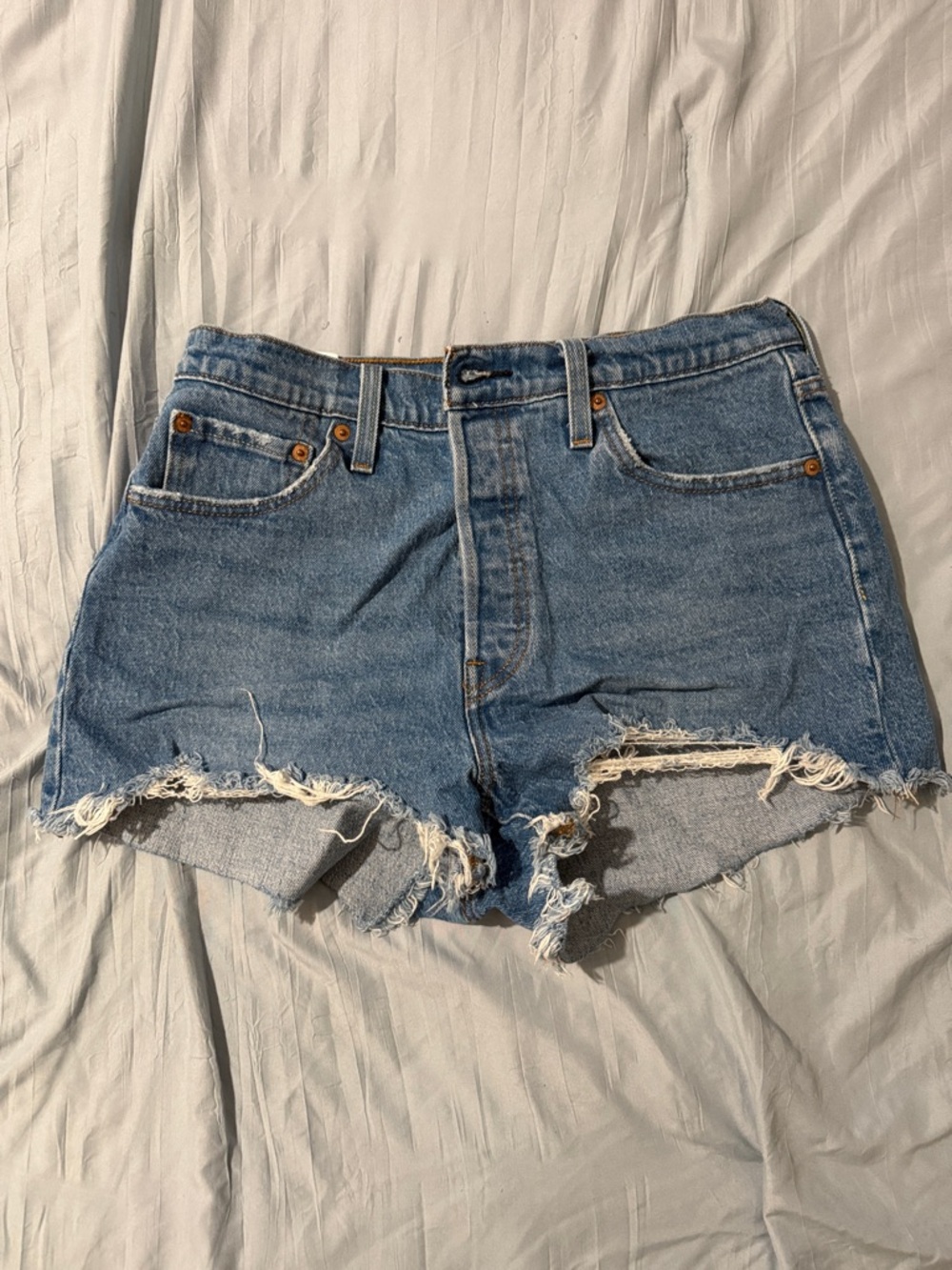 Levi's Distressed Light Blue Cutoff Jean Shorts